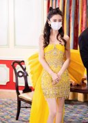  Angelababy穿明黄色短裙秀美腿 蝴蝶结卷发造型似在逃公主 